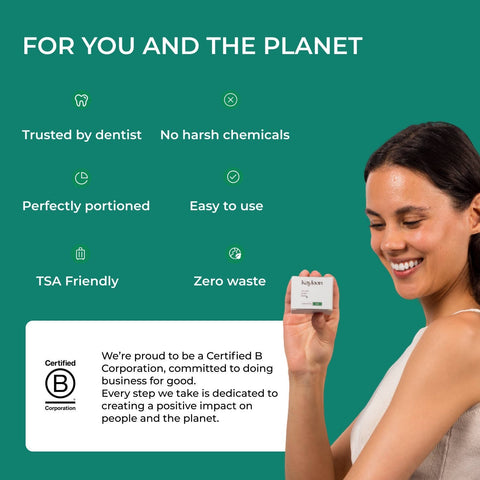 Eden’s Market Kaylaan fluoride toothpaste tablet trial pack held by a smiling woman against a green background.
